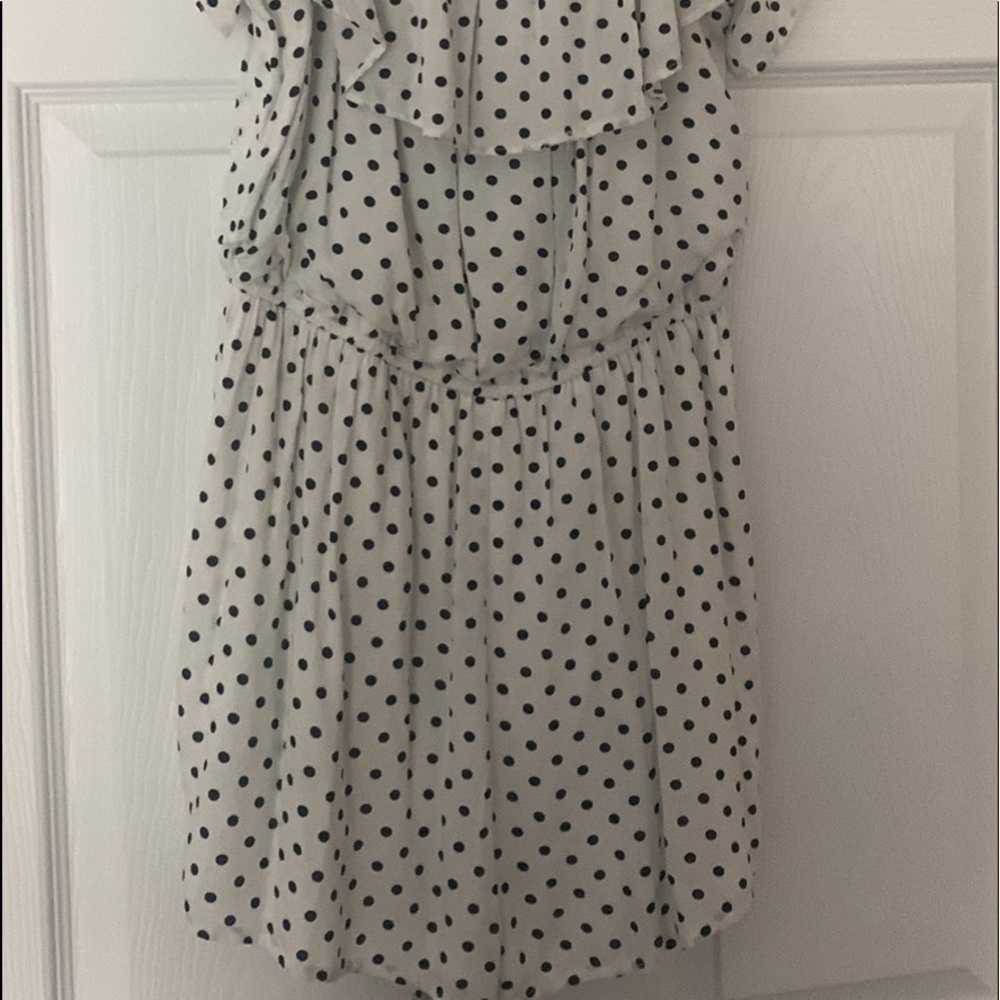 Polka Dot Romper.  NWT.  Can be worn on or off shoulder.   Smoke free home!